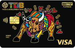 A colorful bull with horns and hearts on a black background

Description automatically generated